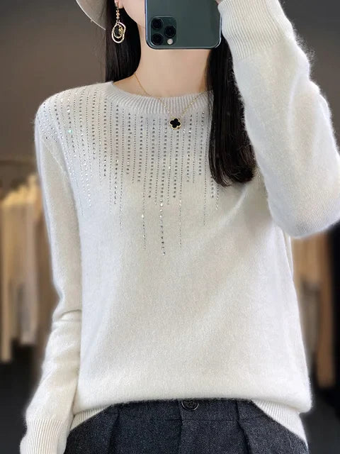 Glänzender Pullover