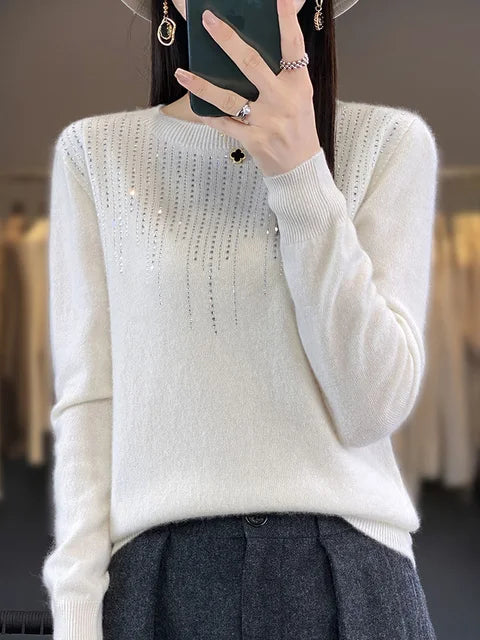 Glänzender Pullover