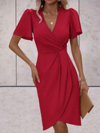 elegante wikkeljurk met korte mouwen