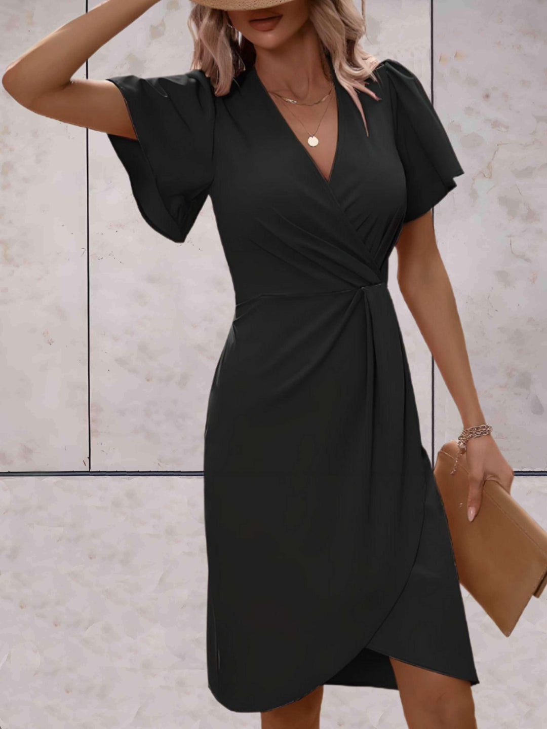 elegante wikkeljurk met korte mouwen