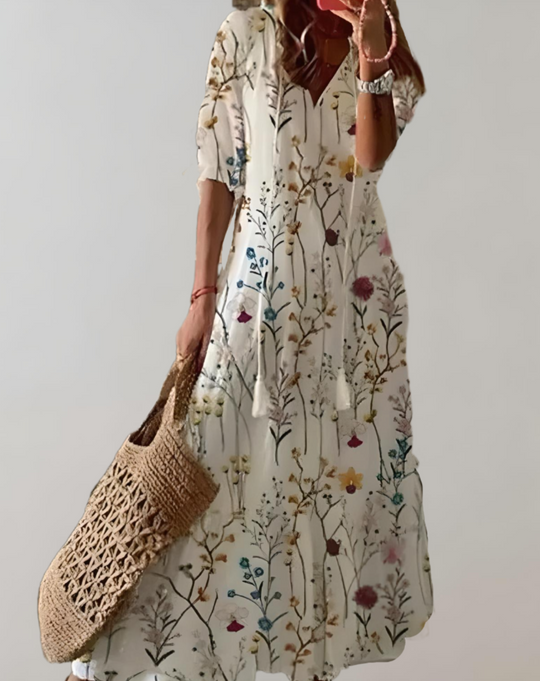 Bohemian maxi-jurk met bloemenprint, halve mouwen en een verstelbaar koordje