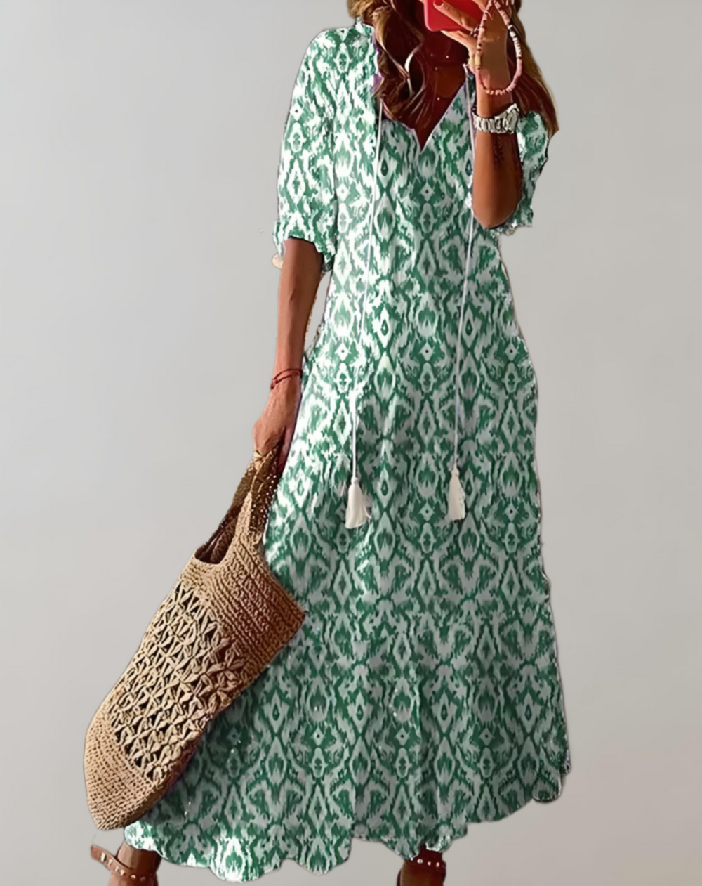 Bohemian maxi-jurk met bloemenprint, halve mouwen en een verstelbaar koordje