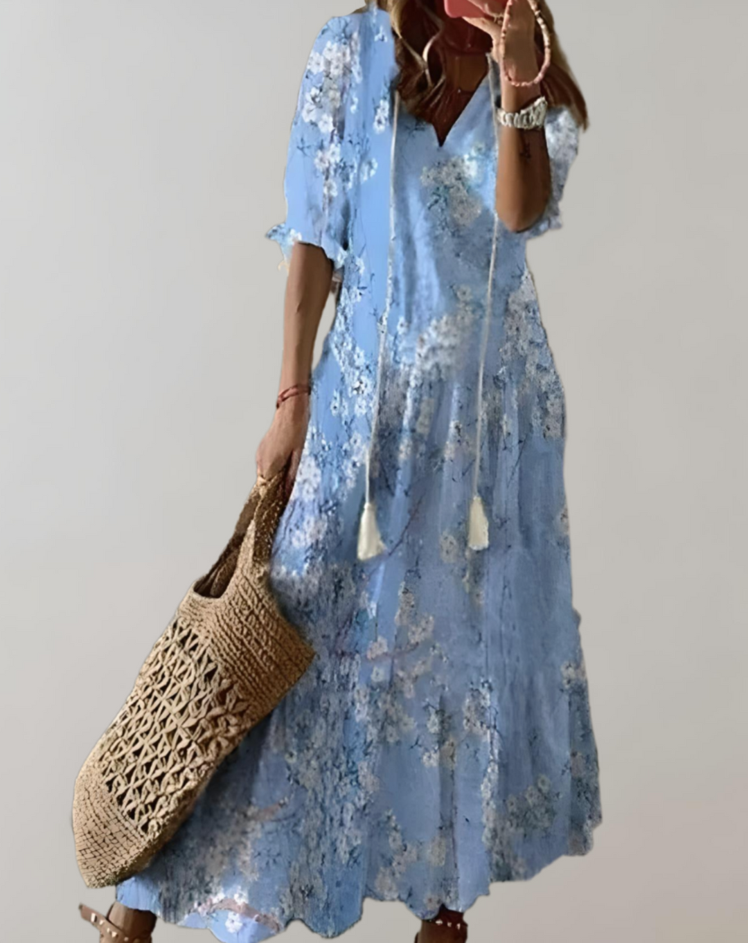 Bohemian maxi-jurk met bloemenprint, halve mouwen en een verstelbaar koordje