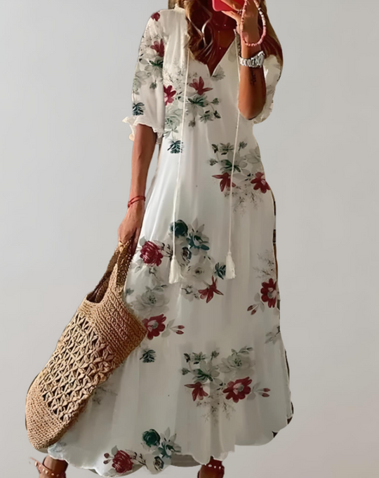 Bohemian maxi-jurk met bloemenprint, halve mouwen en een verstelbaar koordje