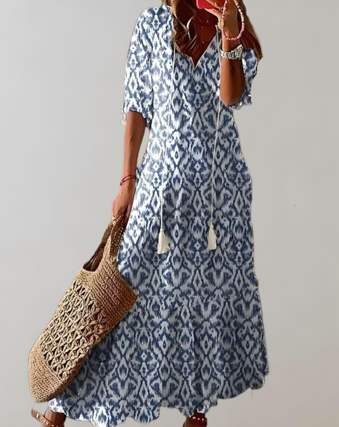 Bohemian maxi-jurk met bloemenprint, halve mouwen en een verstelbaar koordje
