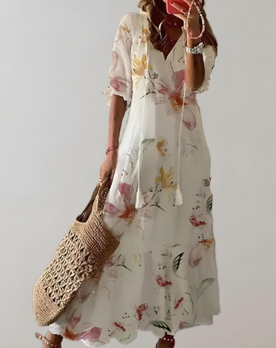 Bohemian maxi-jurk met bloemenprint, halve mouwen en een verstelbaar koordje