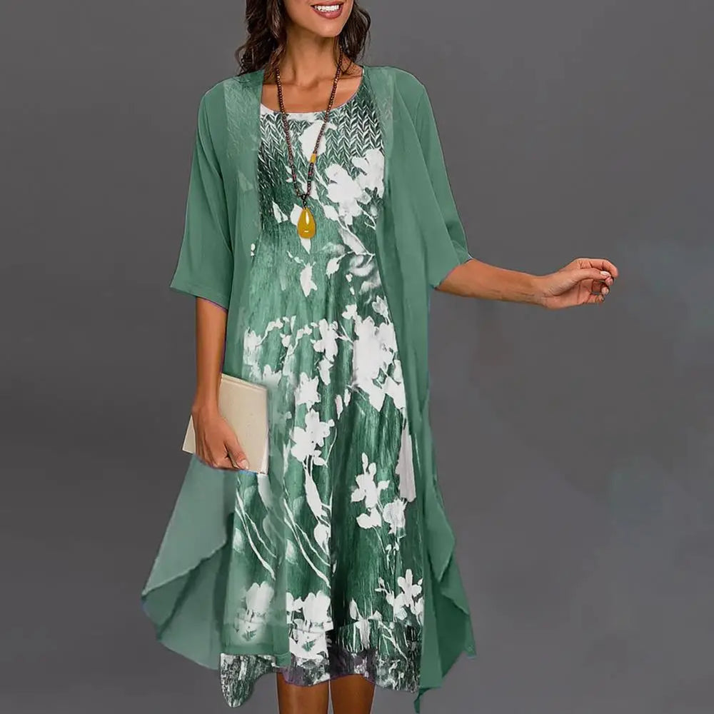 elegantes Kleid mit Blumenmuster und halblangen Ärmeln