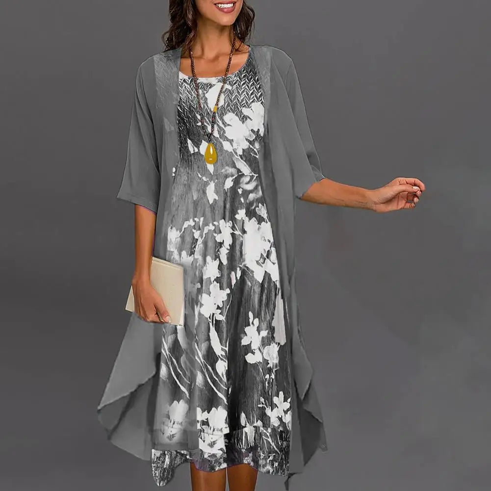 elegantes Kleid mit Blumenmuster und halblangen Ärmeln