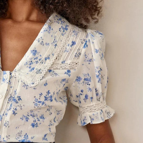 blouse met bloemenpatroon en kanten zoom