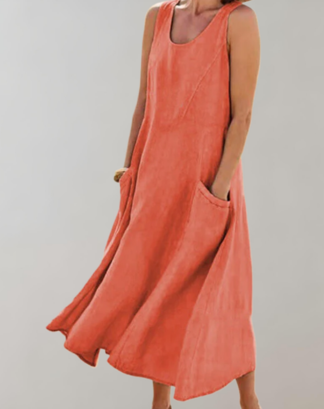 Comfortabele loose fit mouwloze katoenen jurk met een U-hals en zakken