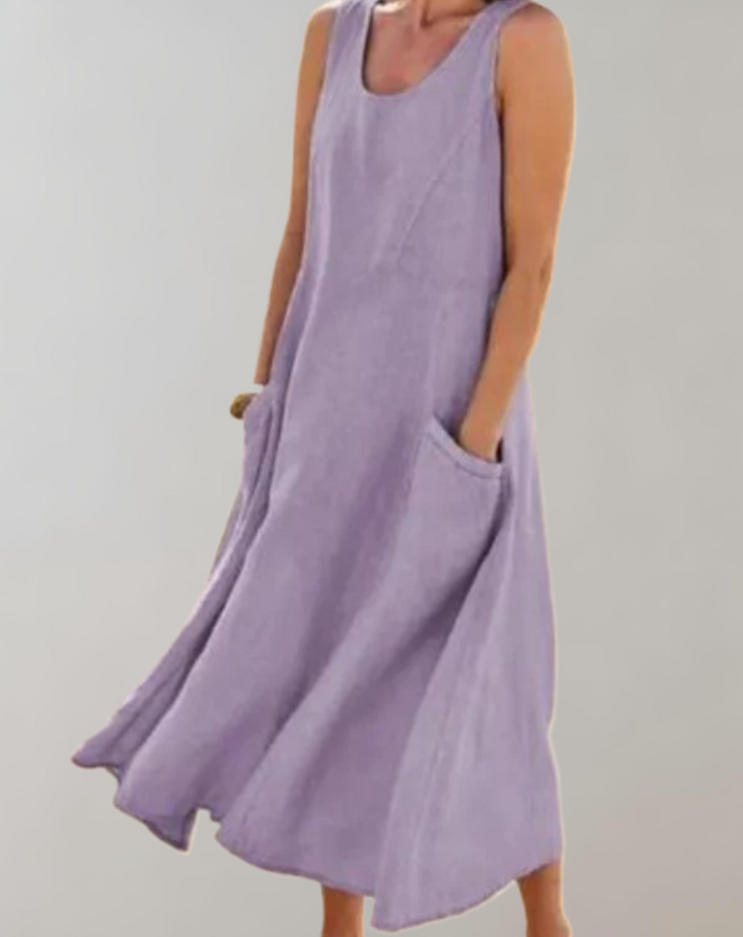 Comfortabele loose fit mouwloze katoenen jurk met een U-hals en zakken