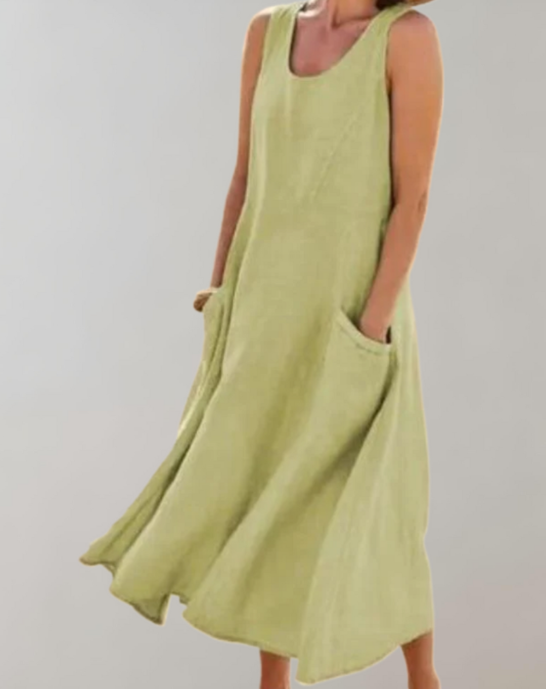 Comfortabele loose fit mouwloze katoenen jurk met een U-hals en zakken