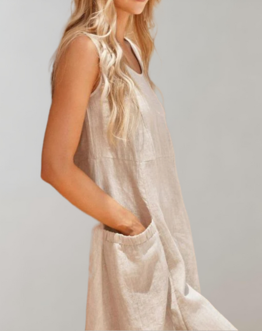 Comfortabele loose fit mouwloze katoenen jurk met een U-hals en zakken