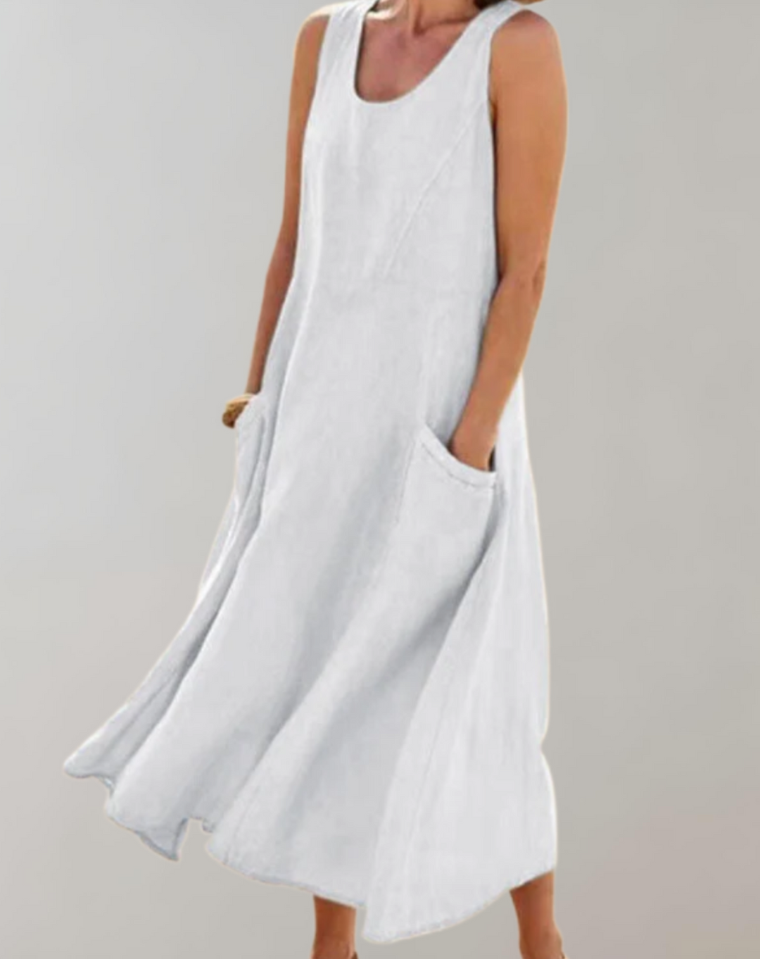 Comfortabele loose fit mouwloze katoenen jurk met een U-hals en zakken