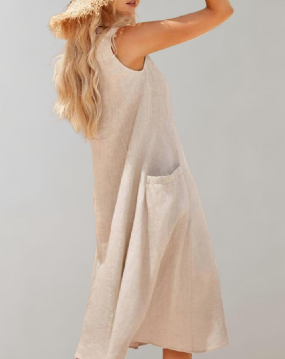 Comfortabele loose fit mouwloze katoenen jurk met een U-hals en zakken