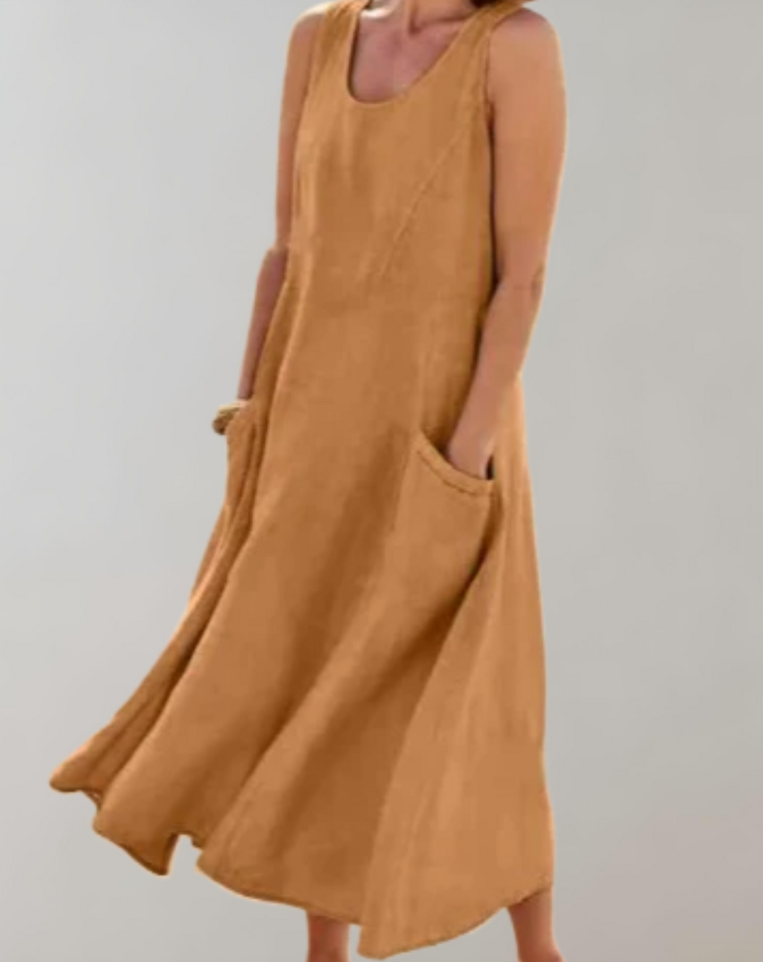 Comfortabele loose fit mouwloze katoenen jurk met een U-hals en zakken