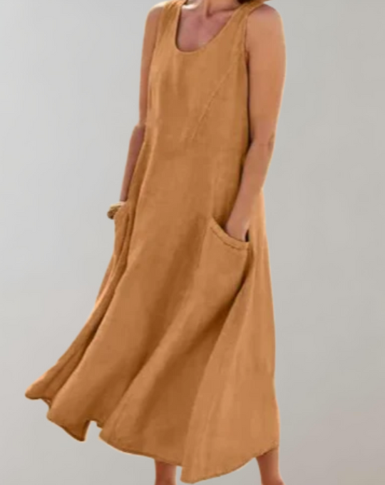Comfortabele loose fit mouwloze katoenen jurk met een U-hals en zakken