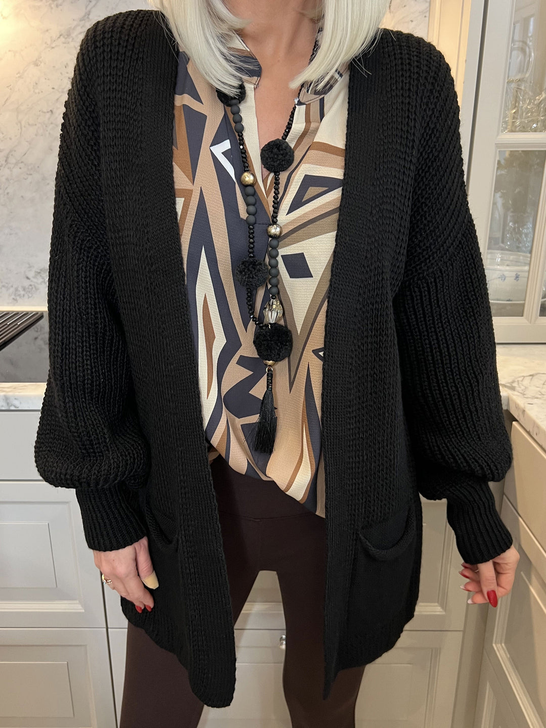Heidi-Mode | Kurze Strickjacke mit Ballonärmeln