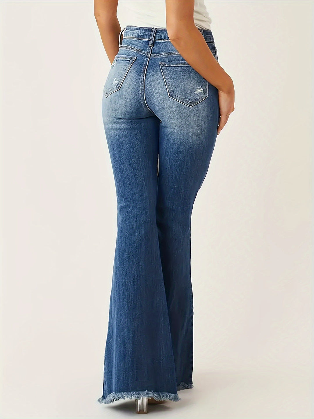 Heidi-Mode | Ausgestellte Jeans mit Rissdetails und Fransen Saum für Frauen