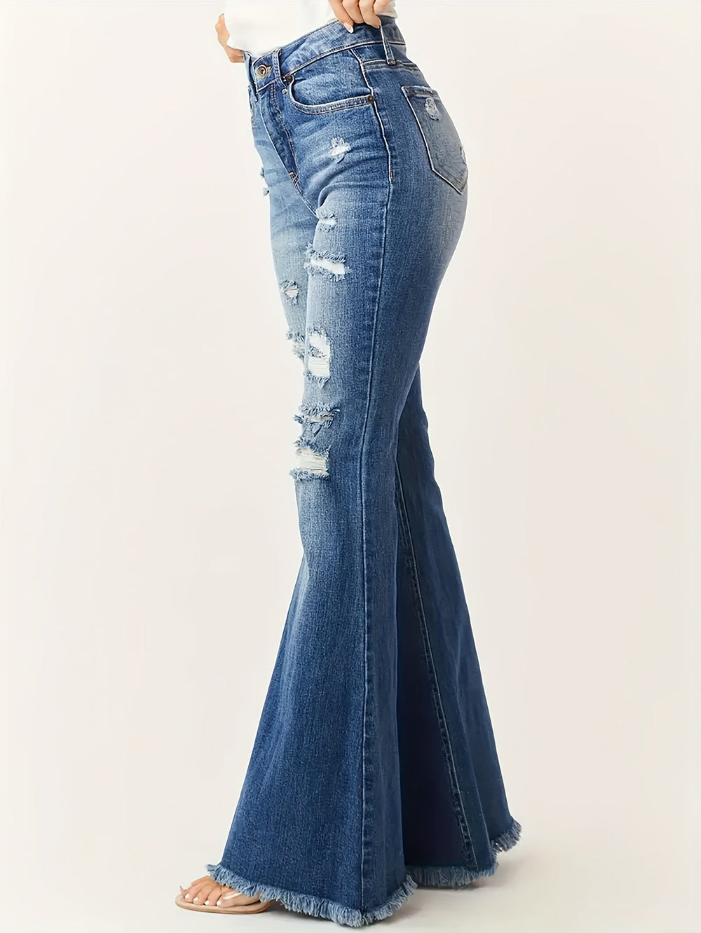 Heidi-Mode | Ausgestellte Jeans mit Rissdetails und Fransen Saum für Frauen
