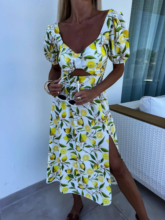 Damen Maxi Kleid mit Fruchtmotiv und Cut-Out-Details Heidi-Mode