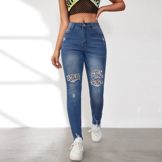 Damen Skinny Jeans mit animalischen Applikationen und Distressed-Effekten Heidi-Mode