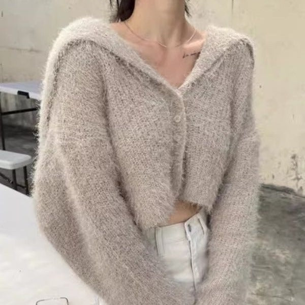 Damen lässiger Pullover mit tiefem V-Ausschnitt und strukturiertem Maschenmuster Heidi-Mode