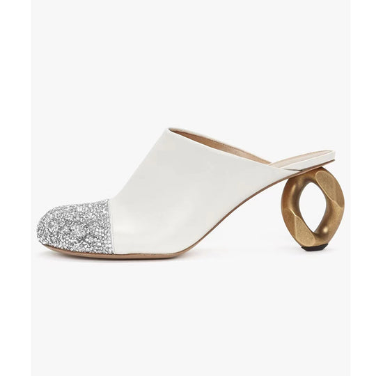 Femme Open-Toe Mules mit skulpturalem metallischem Absatz Heidi-Mode
