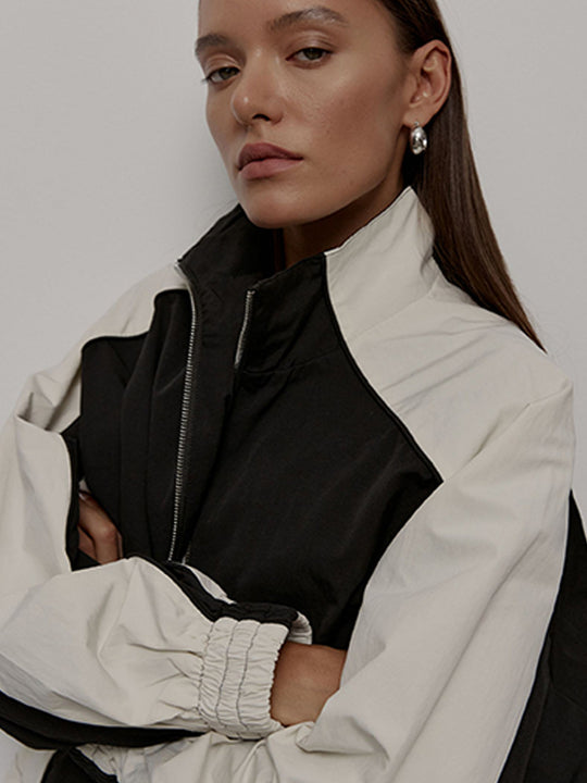Damen sportliche Kapuzenjacke mit hohem Kragen und asymmetrischem Design Heidi-Mode