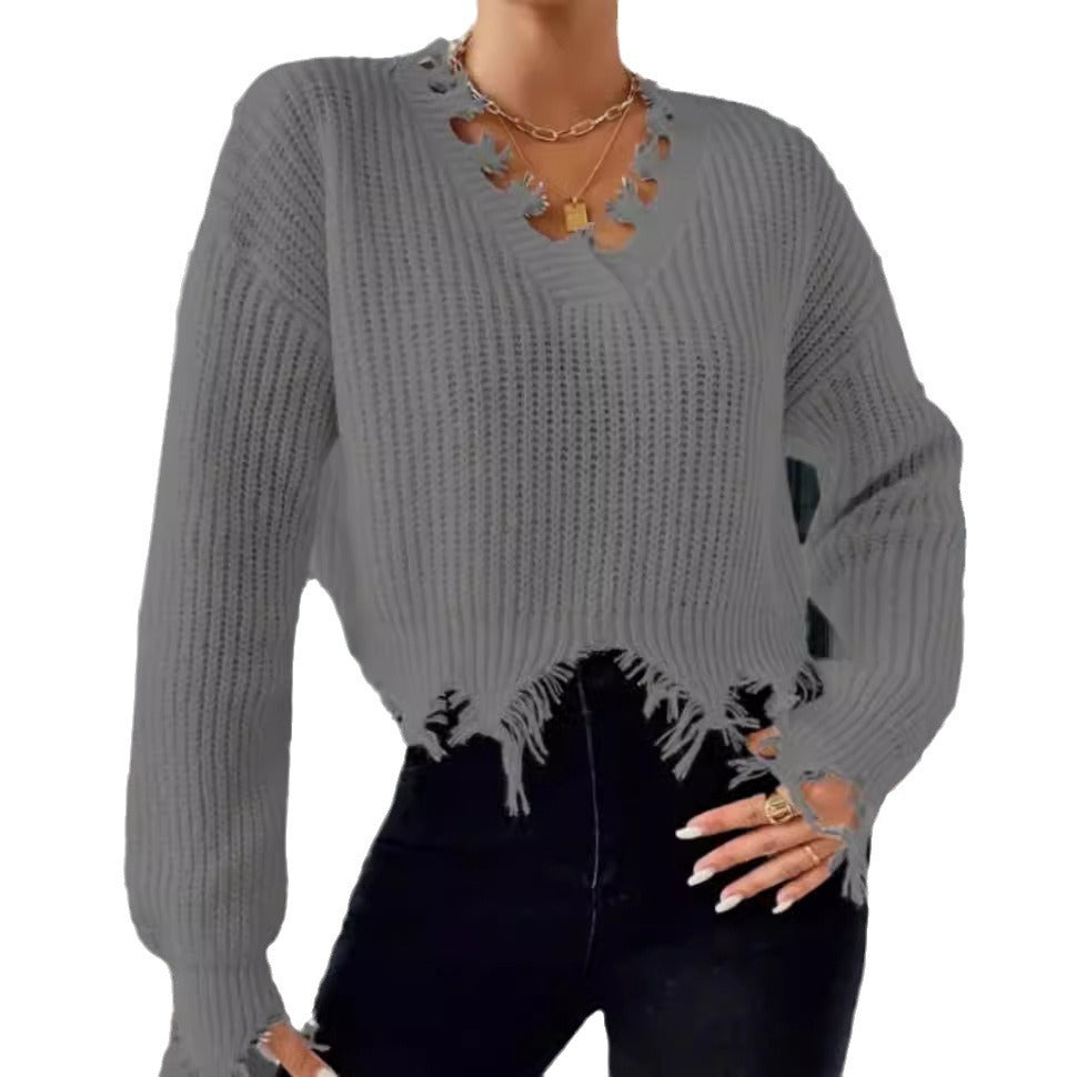 Damen Oversized Strickpullover mit fransigem Saum und raffiniertem Ausschnitt Heidi-Mode