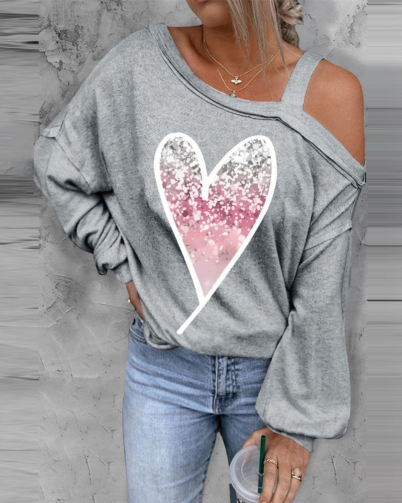 Damen lässiger Oversized Pullover mit herzförmigem Glitzer-Design Heidi-Mode