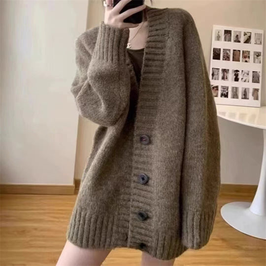 Damen Grobstrickjacke mit voluminösen Ärmeln und knöpfbarem Ausschnitt Heidi-Mode