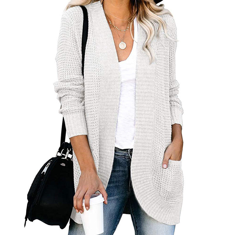 Damen Strickjacke mit tiefem V-Ausschnitt und praktischen Taschen Heidi-Mode