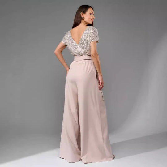 Damen Glitzernder Jumpsuit mit weitem Bein und Taillengürtel Heidi-Mode
