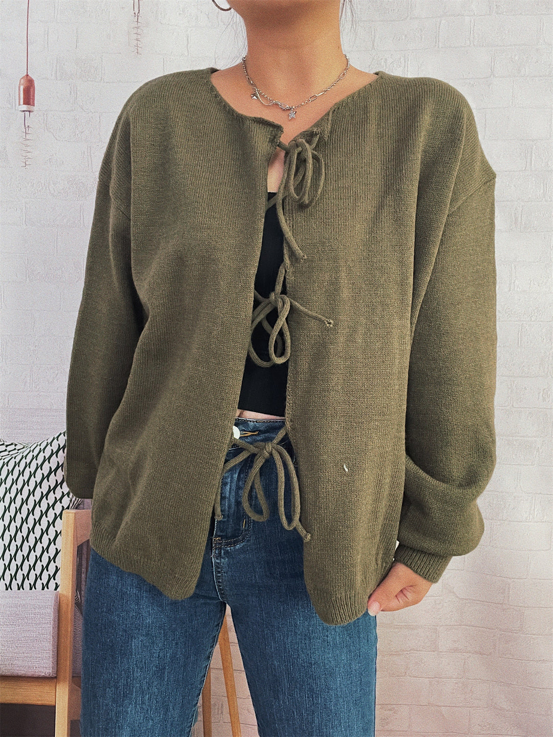 Damen Strickjacke mit dekorativem Schnürdesign und weitem Schnitt Heidi-Mode