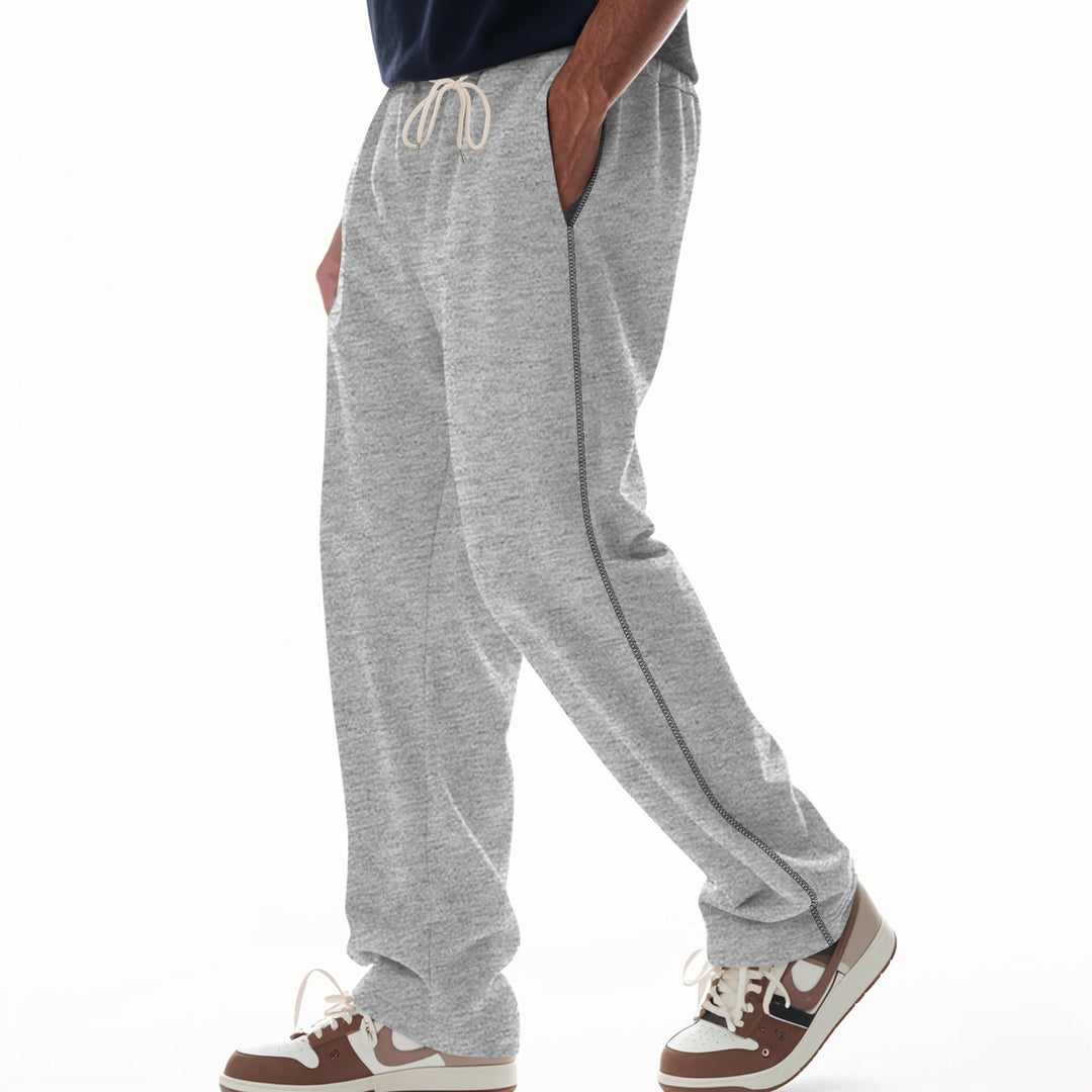 Herren bequeme Sweatpants mit kontrastierenden Nähten und praktischen Seitentaschen Heidi-Mode