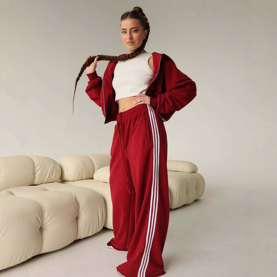 Damen Trendiges Sport-Lounge-Set mit cropped Sweatjacke und weit geschnittenen Jogginghosen Heidi-Mode