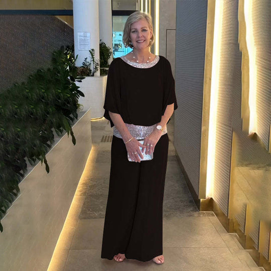 Damen Eleganter Jumpsuit mit schimmerndem Oberteil und weitem Bein Heidi-Mode