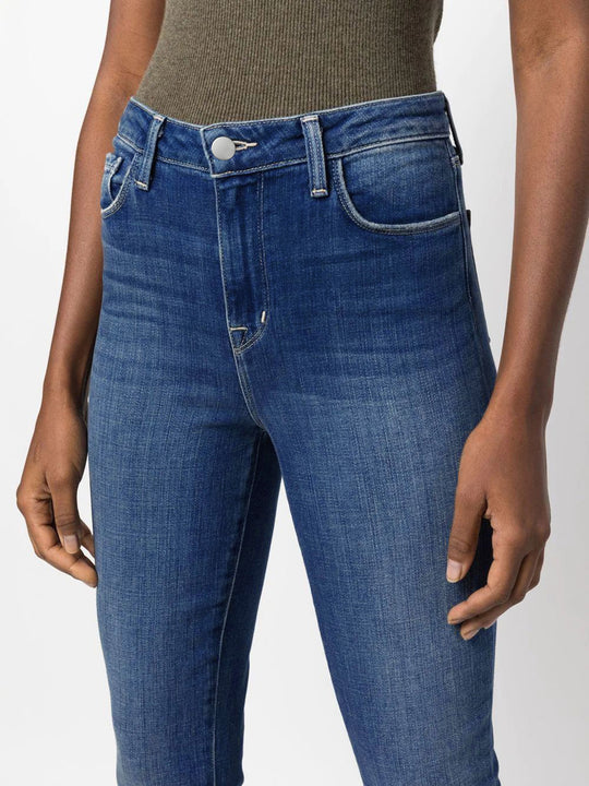 Damen Bootcut Jeans im legeren Design mit fransigem Saum und hohem Taillenbund Heidi-Mode