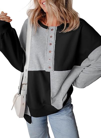 Damen lässiger Kapuzenpullover mit Knopfdetails und Farbblockdesign Heidi-Mode