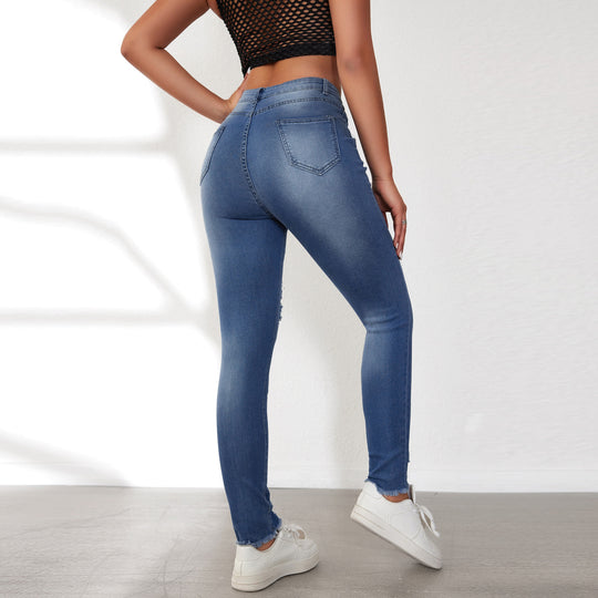 Damen Skinny Jeans mit animalischen Applikationen und Distressed-Effekten Heidi-Mode