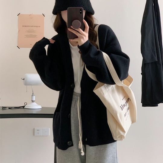 Damen Gemütliche Strickjacke mit weiten Ärmeln und praktischen Taschen Heidi-Mode