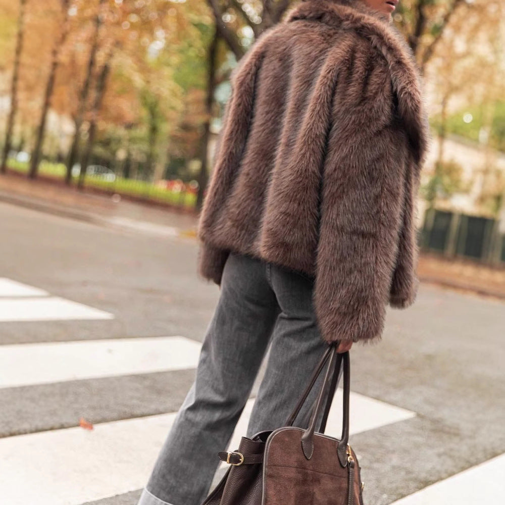 Damen Luxuriöse Kunstfelljacke mit voluminösen Ärmeln und breitem Revers Heidi-Mode