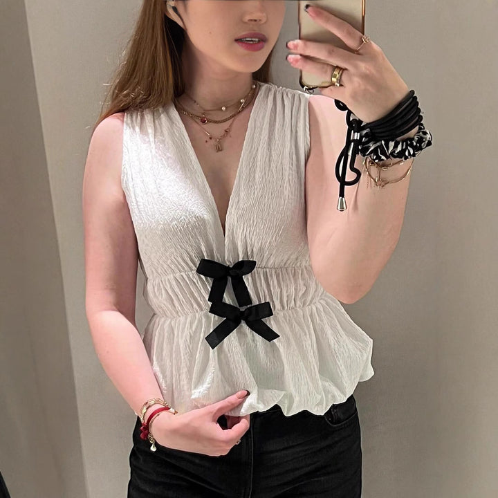 Damen ärmelloses Oberteil mit dekorativen Schleifen und elastischem Bund Heidi-Mode
