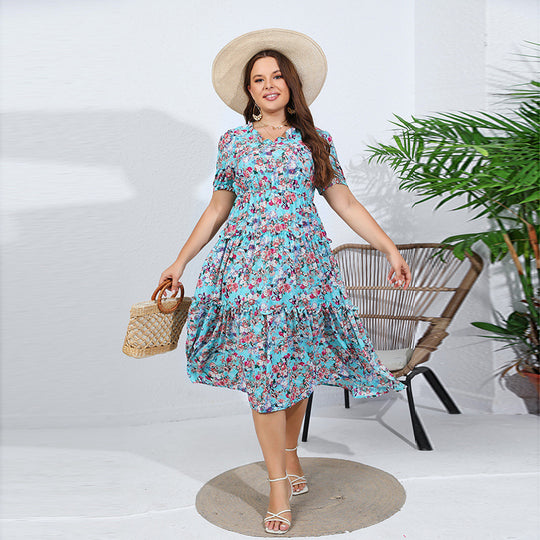 Damen Midikleid mit verspieltem Blütenmuster und voluminösem Rock Heidi-Mode