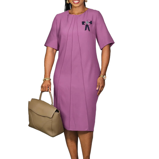 Damen Abendkleid mit elegantem Rüschendetail und stilvollem Broschendekor Heidi-Mode