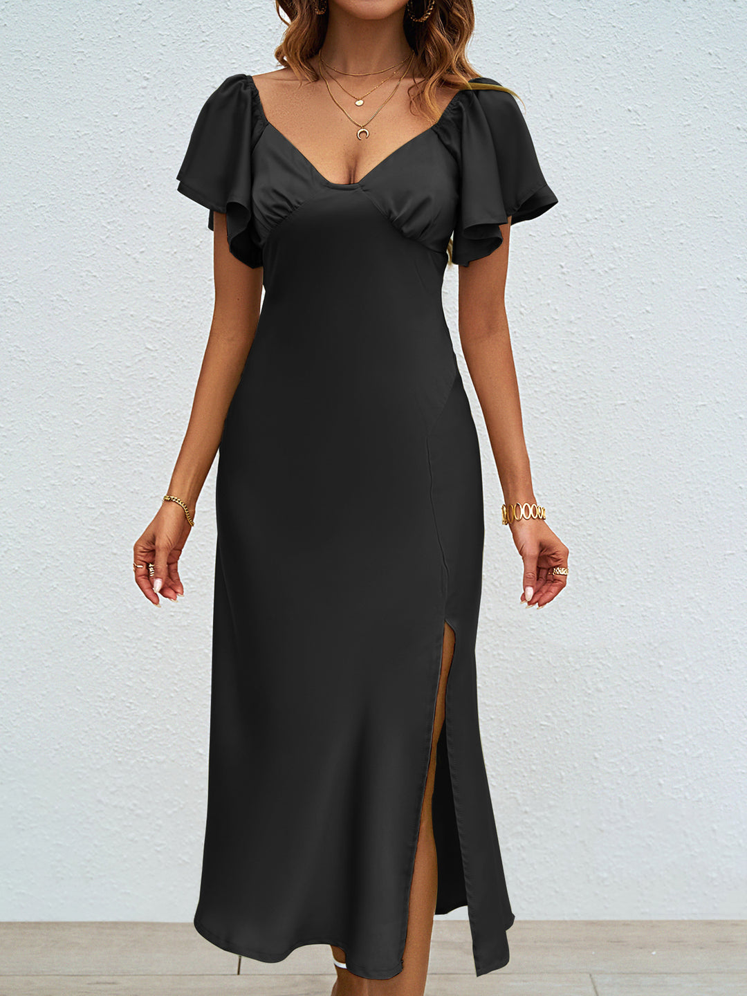 Damen Maxikleid mit eleganten Puffärmeln und seitlichem Schlitz Heidi-Mode