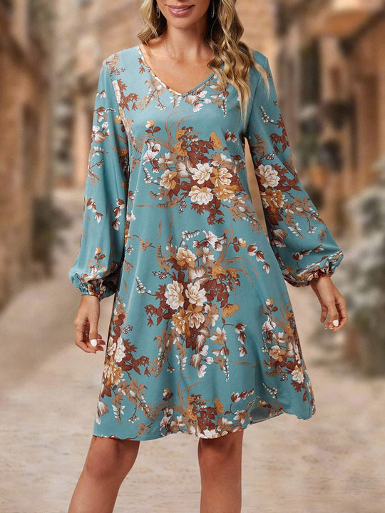 Damen Blusenkleid mit floralem Design und voluminösen Ärmeln Heidi-Mode