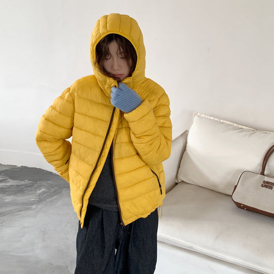 Damen ultraleichte Pufferjacke mit abnehmbarer Kapuze und elastischem Saum Heidi-Mode