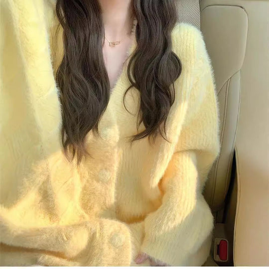 Damen Oversized Strickjacke mit weichem Fleece und besonderen Knopfdetails Heidi-Mode